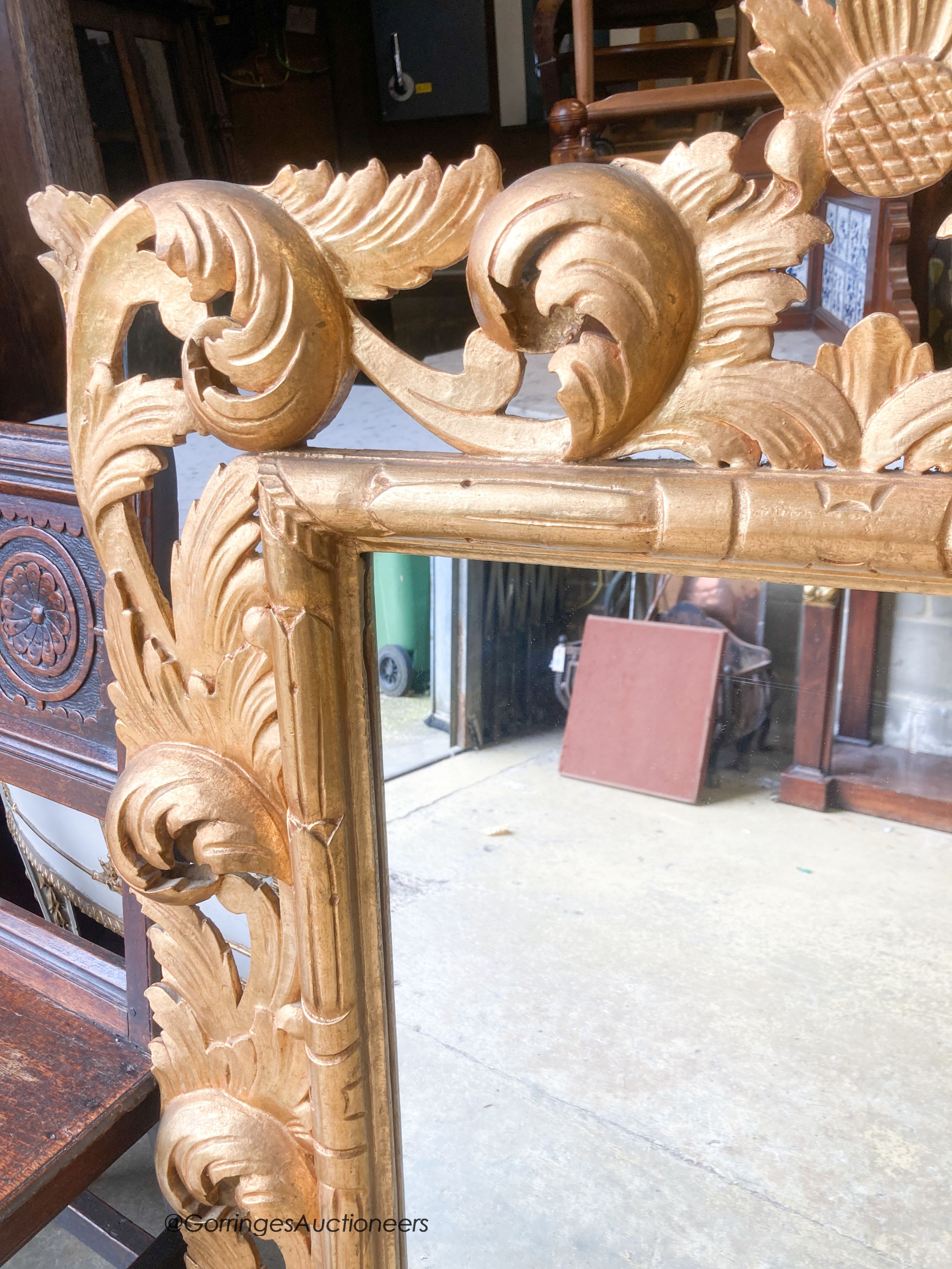 A 20th century Florentine style gilt wood mirror, width 84cm, height 107cm